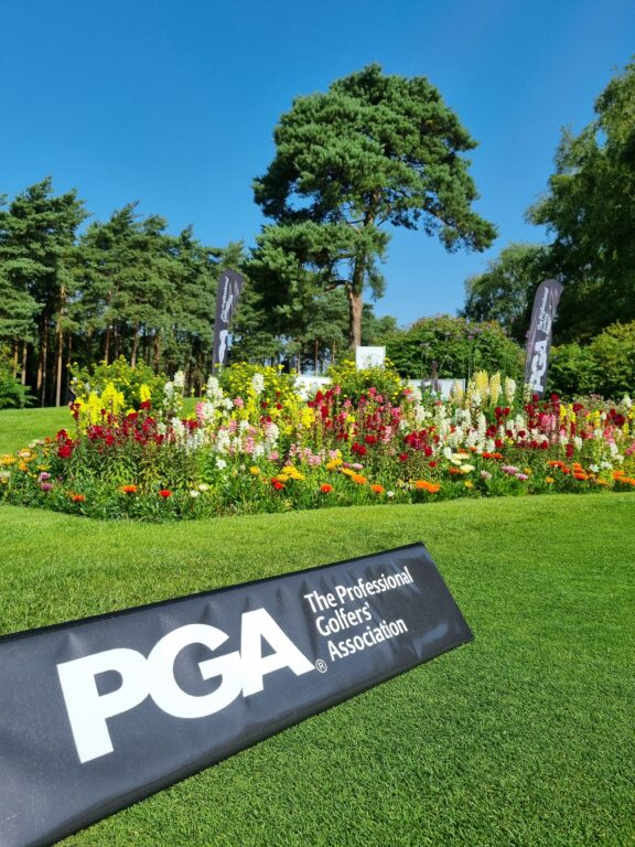 Pga Banner Flowers And 1st Tee